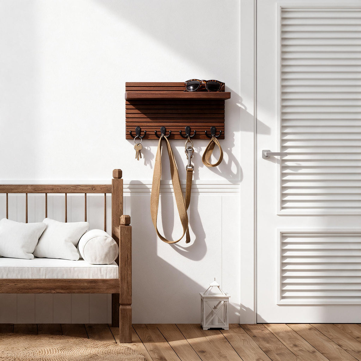 Wall-mounted wood key holder holding keys near the front door
