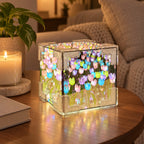 Rainbow DIY tulip mirror LED night light glowing on a living room table