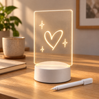 GlowNote LED message board lamp glowing on a modern home office desk