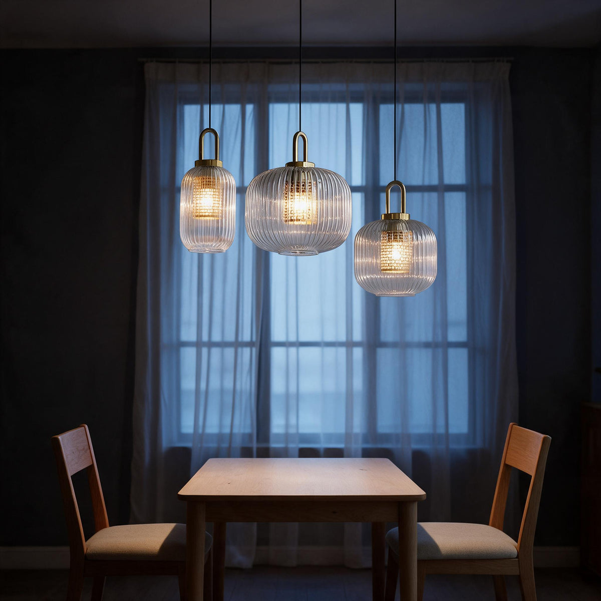 Three shade size options of the striped glass pendant light side by side