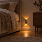 Dark wood motion sensor wall light providing bedside pathway lighting