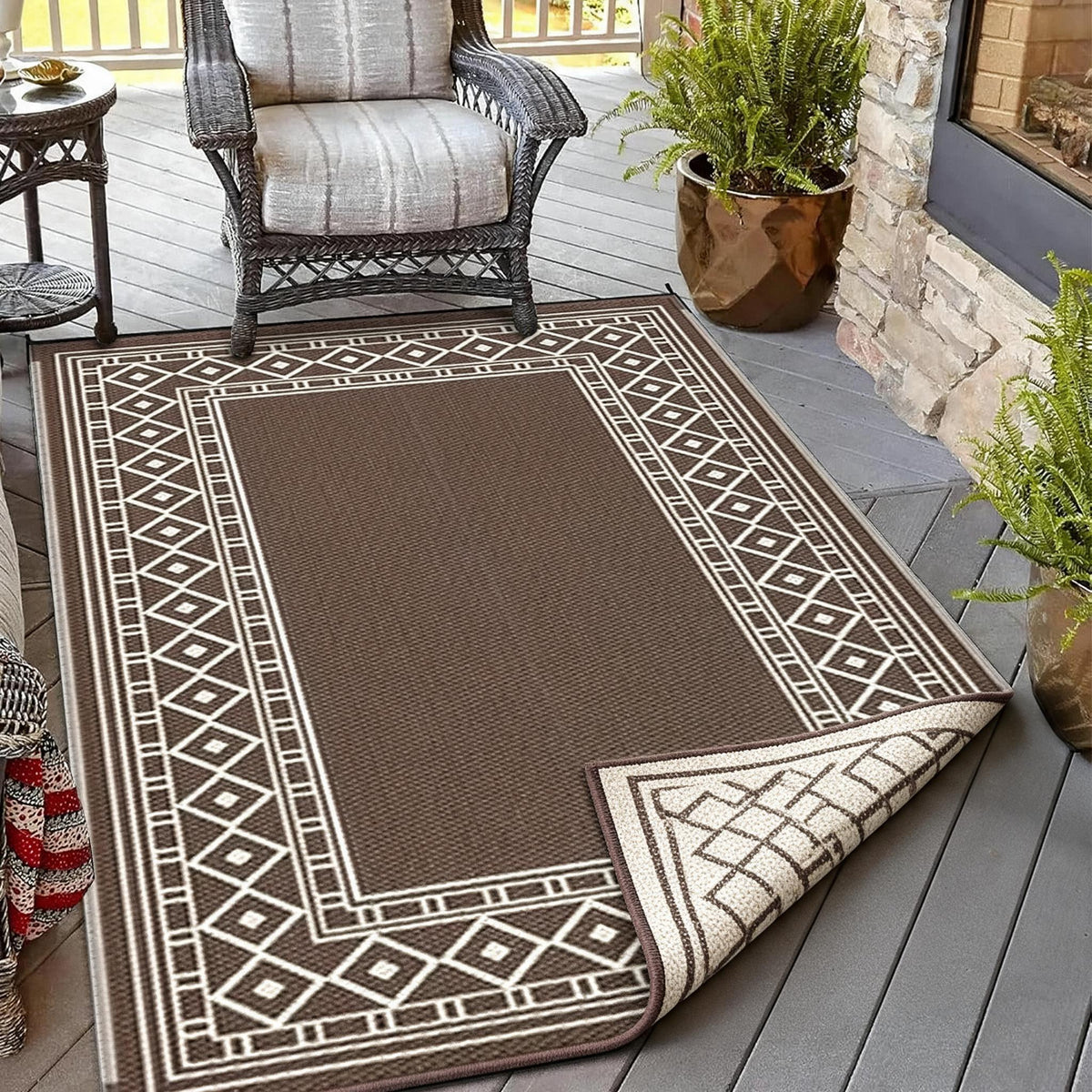 Close-up of the rug's two reversible geometric pattern sides shown side by side.