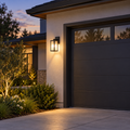 Style B compact IP65 aluminum outdoor wall light beside a modern garage