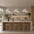 Three gray Wabi-Sabi pendant chandeliers installed above a kitchen island